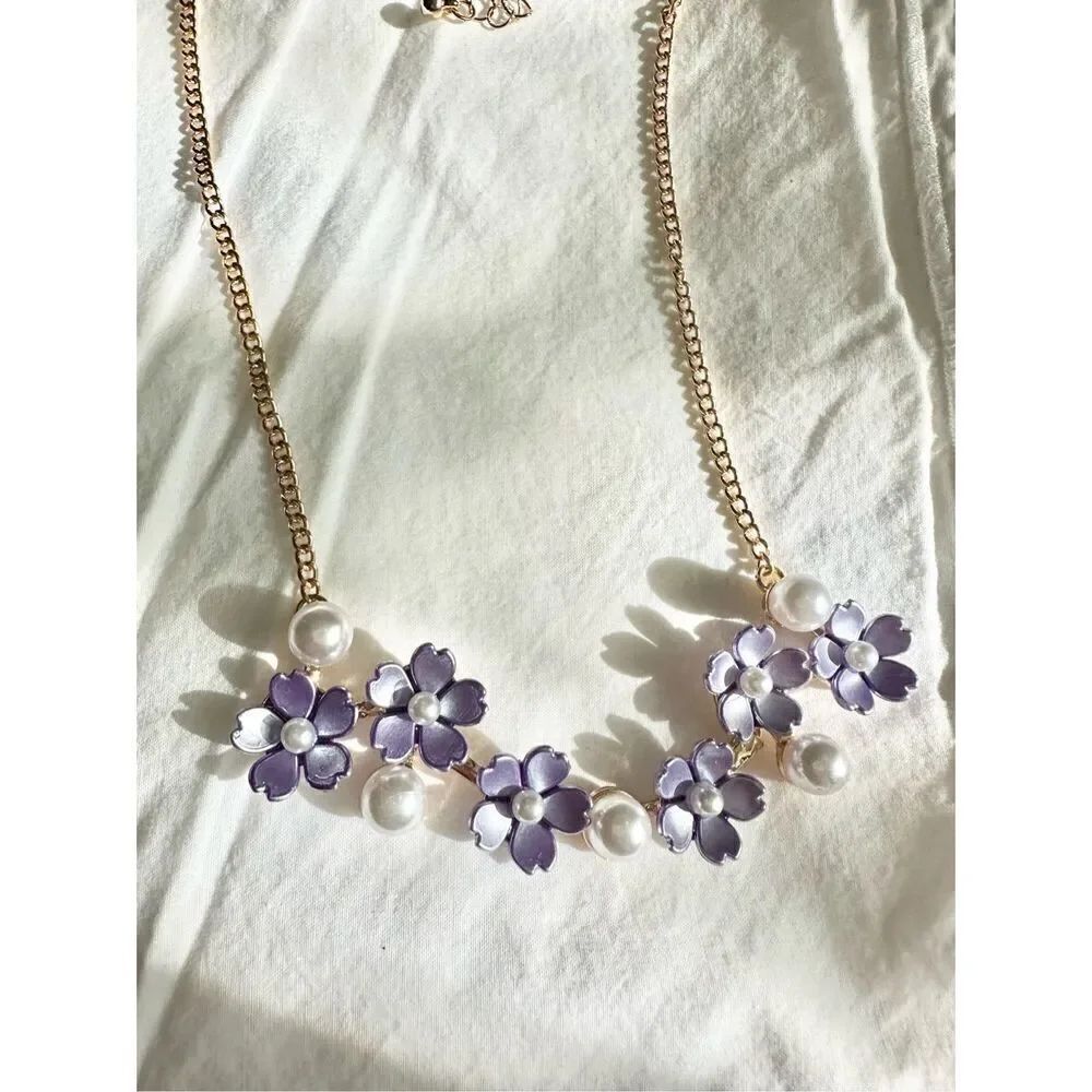 Purple flower and pearl statement necklace